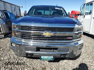 2015 Chevrolet Silverado 3500HD LTZ with VIN 1GC4K0E80FF577143, listed as a Copart auction lot 76626244 with 41,587 mi miles and Salvage Title. Bid and sale history available at carsss.com. Image 5.