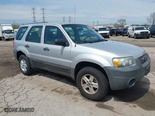 2007 Ford Escape XLS with VIN 1FMYU02Z97KB80446, listed as a IAAI auction lot 42113186 with 128,492 mi miles. Bid and sale history available at carsss.com. Image 1.