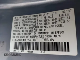 2007 Honda CR-V EX z VIN JHLRE48577C074317, wystawiony jako IAAI lot #42382403 z przebiegiem 383 109 mil mil oraz . Historia ofert i sprzedaży dostępna na DreamBid. Obrazek 9.