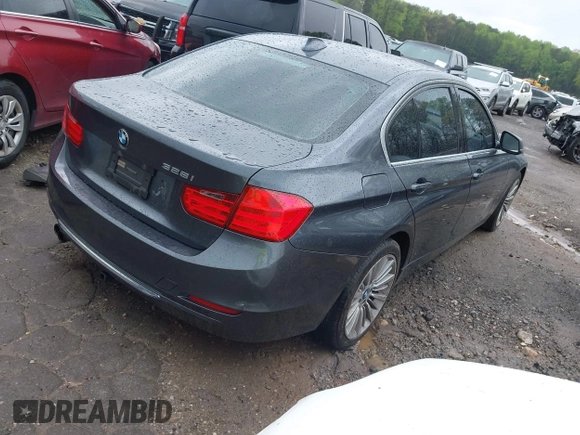 2012 BMW 3 Series 328i with VIN WBA3A5C50CF342321, listed as a IAAI auction lot 41914770 with 185,315 mi miles. Bid and sale history available at carsss.com. Image 4.
