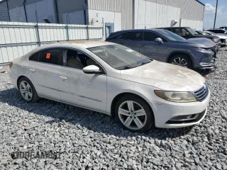 2013 Volkswagen CC Sport with VIN WVWBN7AN7DE541777, listed as a Copart auction lot 55121735 with 132,829 mi miles and Clean Title. Bid and sale history available at carsss.com. Image 4.