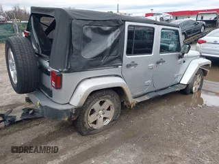 2008 Jeep Wrangler Unlimited Sahara with VIN 1J4GA59158L501099, listed as a IAAI auction lot 41743590 with 213,941 mi miles and . Bid and sale history available at DreamBid. Image 4.