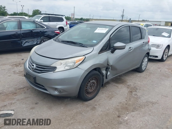 2015 Nissan Note SV with VIN 3N1CE2CP1FL370939, listed as a IAAI auction lot 42149229 with 130,136 mi miles and . Bid and sale history available at DreamBid. Image 2.