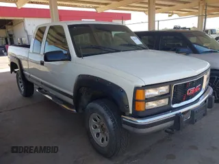 1995 GMC Sierra 1500 z VIN 2GTEK19K9S1591415, wystawiony jako IAAI lot #42011093 z przebiegiem 334 476 mil mil oraz . Historia ofert i sprzedaży dostępna na DreamBid. Obrazek 1.