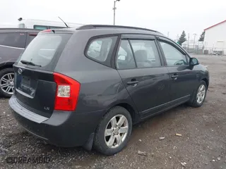 2007 Kia Rondo LX with VIN KNAFG525677081273, listed as a IAAI auction lot 42021437 with 191,413 mi miles. Bid and sale history available at carsss.com. Image 4.
