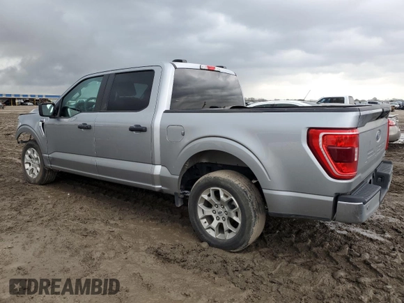 2023 Ford F-150 XL with VIN 1FTEW1C85PKD62576, listed as a Copart auction lot 44970775 with 52,070 mi miles and Salvage title. Bid and sale history available at DreamBid. Image 2.