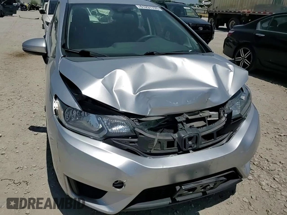 2015 Honda Fit LX z VIN 3HGGK5H52FM738587, wystawiony jako Copart lot #61231705 z przebiegiem 134 623 mil mil oraz Szkoda całkowita • Salvage title. Historia ofert i sprzedaży dostępna na DreamBid. Obrazek 13.