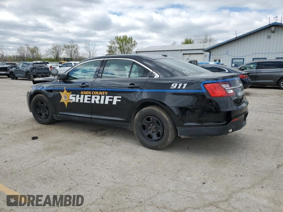 2015 Ford Police Interceptor with VIN 1FAHP2MK7FG159819, listed as a Copart auction lot 53123975 with 136,518 mi miles and Salvage title. Bid and sale history available at DreamBid. Image 2.