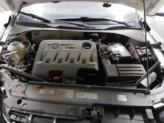 2013 Volkswagen Passat TDI SEL Premium with VIN 1VWCN7A39DC011421, listed as a IAAI auction lot 42042189 with 141,670 mi miles. Bid and sale history available at carsss.com. Image 10.