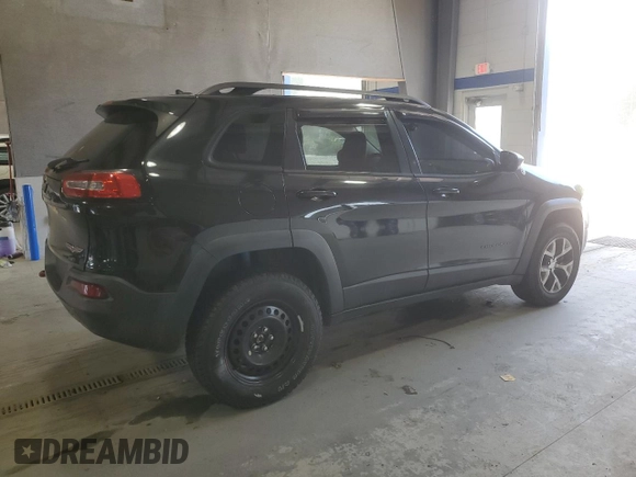 2014 Jeep Cherokee Trailhawk with VIN 1C4PJMBB8EW171116, listed as a Copart auction lot 60107215 with 168,979 mi miles and Salvage title. Bid and sale history available at DreamBid. Image 3.