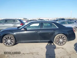 2013 Chrysler 300 with VIN 2C3CCABG7DH573164, listed as a IAAI auction lot 41851066 with 218,234 mi miles. Bid and sale history available at carsss.com. Image 14.