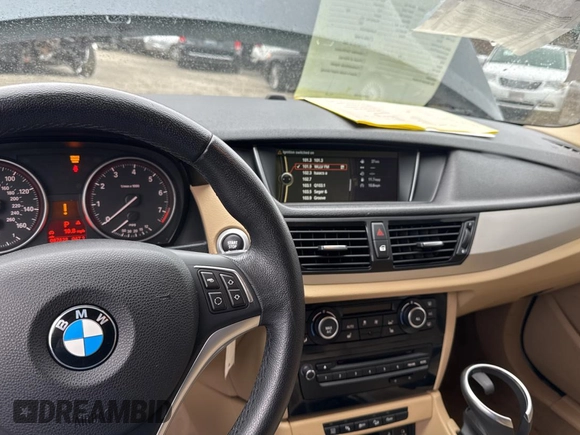 2015 BMW X1 xDrive28i with VIN WBAVL1C53FVY34430, listed as a Copart auction lot 49547905 with 87,431 mi miles and Clean Title. Bid and sale history available at carsss.com. Image 9.