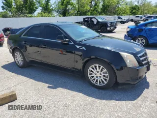 2011 Cadillac CTS Luxury with VIN 1G6DG5EYXB0127398, listed as a Copart auction lot 56472925 with 148,633 mi miles and Salvage title. Bid and sale history available at DreamBid. Image 4.