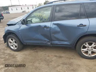 2009 Toyota RAV4 with VIN JTMZF33V59D002606, listed as a IAAI auction lot 41944961 with 146,445 mi miles. Bid and sale history available at carsss.com. Image 6.