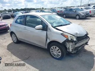 2015 Toyota Yaris L with VIN VNKJTUD34FA026280, listed as a IAAI auction lot 41691078 with 81,030 mi miles. Bid and sale history available at carsss.com. Image 1.
