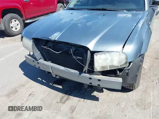 2006 Chrysler 300 with VIN 2C3KA43R06H218634, listed as a IAAI auction lot 41821366 with 150,313 mi miles. Bid and sale history available at carsss.com. Image 6.