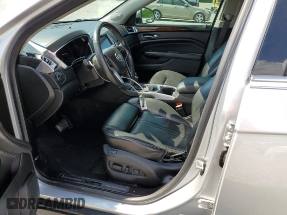 2015 Cadillac SRX Performance Collection with VIN 3GYFNCE3XFS573287, listed as a Copart auction lot 59927205 with 157,322 mi miles and Salvage title. Bid and sale history available at DreamBid. Image 7.