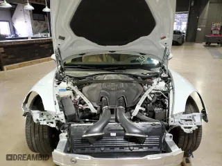 2022 Porsche Panamera with VIN WP0AJ2A75NL102179, listed as a Copart auction lot 58626814 with 7,100 mi miles and Salvage Title. Bid and sale history available at carsss.com. Image 5.