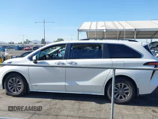2021 Toyota Sienna XLE z VIN 5TDJRKEC7MS009306, wystawiony jako IAAI lot #42328482 z przebiegiem 169 443 mil mil oraz . Historia ofert i sprzedaży dostępna na DreamBid. Obrazek 14.