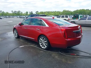 2013 Cadillac XTS Premium with VIN 2G61S5S34D9237236, listed as a IAAI auction lot 41994164 with 218,719 mi miles. Bid and sale history available at carsss.com. Image 3.