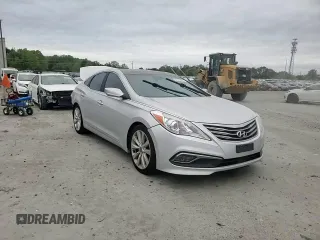 2016 Hyundai Azera Limited z VIN KMHFH4JG6GA518314, wystawiony jako Copart lot #53917085 z przebiegiem 192 713 mil mil oraz Szkoda całkowita • Salvage title. Historia ofert i sprzedaży dostępna na DreamBid. Obrazek 13.