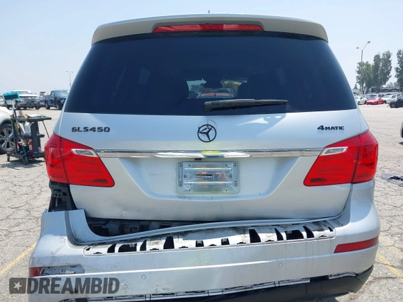 2014 Mercedes-Benz GL 450 z VIN 4JGDF7CE9EA411572, wystawiony jako IAAI lot #42461631 z przebiegiem 121 885 mil mil oraz . Historia ofert i sprzedaży dostępna na DreamBid. Obrazek 16.