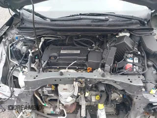 2015 Honda CR-V EX with VIN 2HKRM4H55FH695025, listed as a IAAI auction lot 41963437 with 130,891 mi miles and . Bid and sale history available at DreamBid. Image 10.