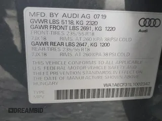 2020 Audi Q3 Premium with VIN WA1AECF31L1002342, listed as a Copart auction lot 60729665 with 29,154 mi miles and Salvage title. Bid and sale history available at DreamBid. Image 13.