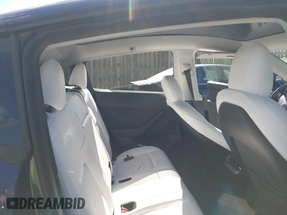 2023 Tesla Model Y Long Range with VIN 7SAYGDEE3PF674457, listed as a IAAI auction lot 41822138 with 43,901 mi miles. Bid and sale history available at carsss.com. Image 8.