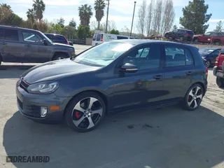 2013 Volkswagen GTI with VIN WVWHD7AJ2DW132851, listed as a IAAI auction lot 42021650 with 83,473 mi miles. Bid and sale history available at carsss.com. Image 6.