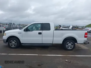 2004 Ford F-150 STX with VIN 1FTRX12W84NC29545, listed as a IAAI auction lot 41921712 with 304,891 mi miles. Bid and sale history available at carsss.com. Image 14.