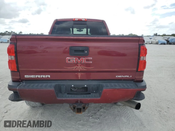 2015 GMC Sierra 2500HD Denali z VIN 1GT120E88FF102231, wystawiony jako Copart lot #54654565 z przebiegiem 305 654 mil mil oraz Czysty tytuł • Clean title. Historia ofert i sprzedaży dostępna na DreamBid. Obrazek 6.