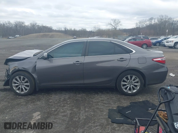 2015 Toyota Camry XLE with VIN 4T1BF1FKXFU936775, listed as a IAAI auction lot 41807486 with 97,148 mi miles and . Bid and sale history available at DreamBid. Image 15.