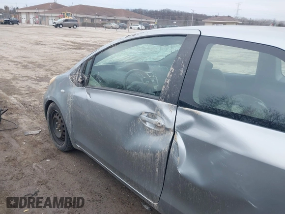 2011 Toyota Yaris with VIN JTDJT4K32B5325815, listed as a IAAI auction lot 41705028 with 137,509 mi miles. Bid and sale history available at carsss.com. Image 15.