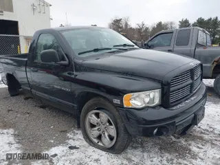 2005 Dodge Ram 1500 SLT with VIN 1D7HU16DX5J597138, listed as a IAAI auction lot 41319558 with 138,671 mi miles. Bid and sale history available at carsss.com. Image 1.