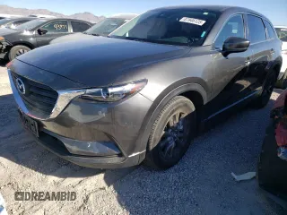 2019 Mazda CX-9 Sport с VIN JM3TCABY0K0317140, выставлен на аукционе Copart как лот 87946125 с пробегом 63 363 миль миль и Списание • Salvage title. История ставок и продаж доступна на DreamBid. Изображение 1.