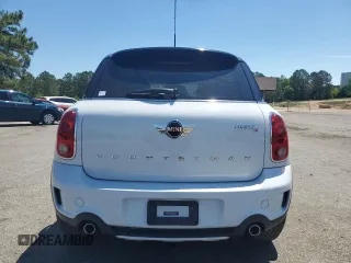 2016 MINI Countryman S with VIN WMWZC5C51GWU00690, listed as a Copart auction lot 55077095 with 104,176 mi miles and Salvage title. Bid and sale history available at DreamBid. Image 6.