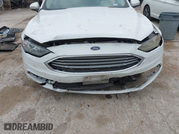 2018 Ford Fusion SE z VIN 3FA6P0HD1JR191576, wystawiony jako IAAI lot #42282669 z przebiegiem 73 439 mil mil oraz . Historia ofert i sprzedaży dostępna na DreamBid. Obrazek 6.