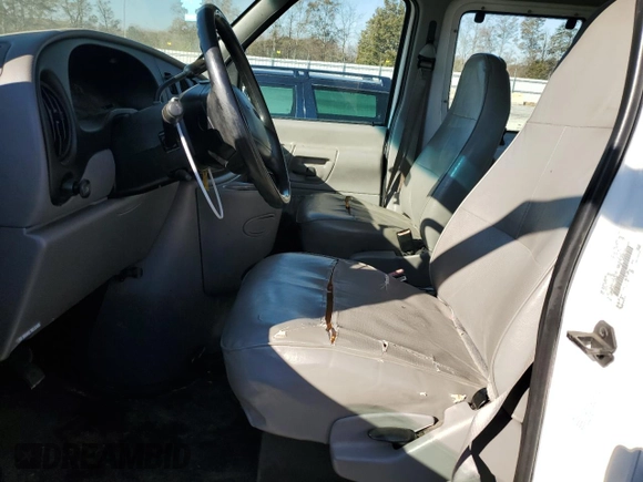 1999 Ford Econoline Passenger XL with VIN 1FBSS31L5XHC16908, listed as a Copart auction lot 83490434 with 159,900 mi miles and Salvage Title. Bid and sale history available at DreamBid. Image 7.