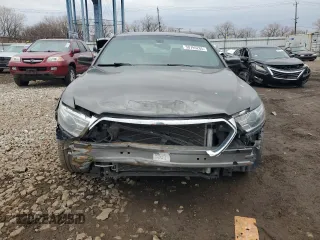 2017 Ford Taurus SEL with VIN 1FAHP2E8XHG105713, listed as a Copart auction lot 50795285 with 136,937 mi miles and Salvage Title. Bid and sale history available at DreamBid. Image 5.