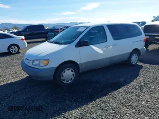 2000 Toyota Sienna CE with VIN 4T3ZF19C3YU189677, listed as a IAAI auction lot 41803833 with 201,661 mi miles. Bid and sale history available at carsss.com. Image 2.