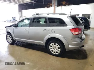 2018 Dodge Journey SE with VIN 3C4PDCAB0JT527478, listed as a Copart auction lot 51521555 with 102,857 mi miles and Salvage Title. Bid and sale history available at carsss.com. Image 2.