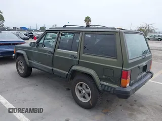 1996 Jeep Cherokee Sport z VIN 1J4FT68S6TL267408, wystawiony jako IAAI lot #42385629 z przebiegiem 268 753 mil mil oraz . Historia ofert i sprzedaży dostępna na DreamBid. Obrazek 3.
