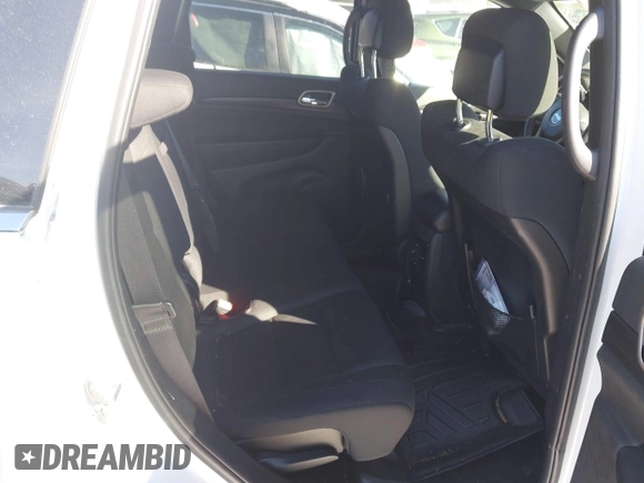 2017 Jeep Grand Cherokee Laredo with VIN 1C4RJFAGXHC959094, listed as a IAAI auction lot 41596916 with 94,611 mi miles. Bid and sale history available at carsss.com. Image 8.