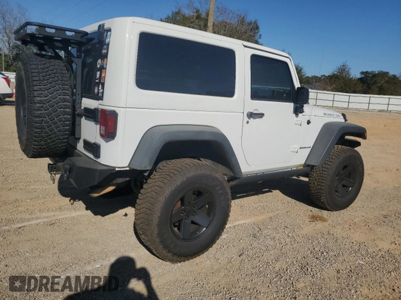 2013 Jeep Wrangler Rubicon with VIN 1C4BJWCG3DL590006, listed as a Copart auction lot 85855594 with 99,218 mi miles and Salvage title. Bid and sale history available at DreamBid. Image 3.