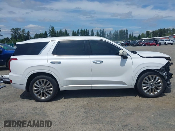 2020 Hyundai Palisade Limited with VIN KM8R5DHE9LU074994, listed as a IAAI auction lot 42596378 with 71,726 mi miles and . Bid and sale history available at DreamBid. Image 14.
