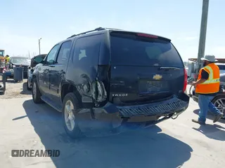 2012 Chevrolet Tahoe LT with VIN 1GNSCBE07CR229240, listed as a IAAI auction lot 41837063 with 219,901 mi miles and . Bid and sale history available at DreamBid. Image 3.
