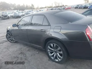 2014 Chrysler 300 S with VIN 2C3CCABG2EH352220, listed as a IAAI auction lot 41796284 with 127,070 mi miles and . Bid and sale history available at DreamBid. Image 14.