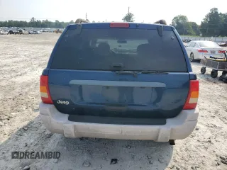 2001 Jeep Grand Cherokee Laredo with VIN 1J4GX48S11C729366, listed as a Copart auction lot 62524565 with 373,749 mi miles and Salvage title. Bid and sale history available at DreamBid. Image 6.
