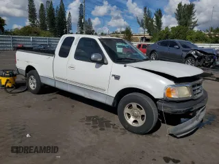 2000 Ford F-150 XL with VIN 1FTRX17W2YNB05575, listed as a Copart auction lot 86606934 with 0 mi miles and Salvage Title. Bid and sale history available at carsss.com. Image 4.